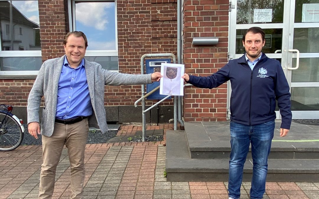 Anstecknadeln für den guten Zweck